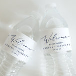Delicate Blue Calligraphy Wedding Welcome Water Bottle Label<br><div class="desc">These delicate blue calligraphy wedding welcome water bottle labels are perfect for a modern wedding. The romantic minimalist design features lovely and elegant midnight blue typography on a white background with a clean and simple look. Personalize these labels with your names, and wedding date. These labels are perfect for destination...</div>
