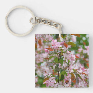 Delicate branch with flowers apple tree keychain
