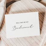 Delicate Calligraphy Bridesmaid Proposal Card<br><div class="desc">This delicate calligraphy bridesmaid proposal card is perfect for a modern wedding. The romantic minimalist design features lovely and elegant black typography on a white background with a clean and simple look. Customize the card with the name of the bride and the bridesmaid. Personalize the back of the card with...</div>