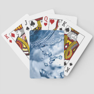 Delicate drops of light blue water playing cards