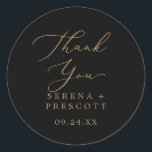 Delicate Gold Black Thank You Favour Sticker<br><div class="desc">These delicate gold and black thank you favour stickers are perfect for a modern wedding reception. The romantic minimalist design features lovely and elegant champagne golden yellow typography on a black background with a clean and simple look. Personalize the sticker labels with your names, the event (if applicable), and the...</div>