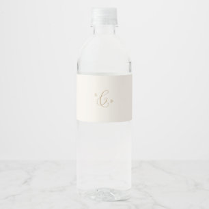 Delicate Gold Calligraphy Cream Monogram Wedding Water Bottle Label