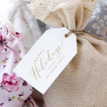 Delicate Gold Happy Holidays Family Holiday Gift Tags<br><div class="desc">These delicate gold happy holidays family holiday gift tags are perfect for a modern holiday present. The romantic minimalist design features lovely and elegant champagne golden yellow typography on a white background with a clean and simple look. Personalize them with your name.</div>