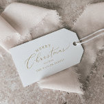 Delicate Gold Merry Christmas Family Holiday Gift Tags<br><div class="desc">These delicate gold Merry Christmas family holiday gift tags are perfect for a modern holiday present. The romantic minimalist design features lovely and elegant champagne golden yellow typography on a white background with a clean and simple look. Personalize them with your name.</div>