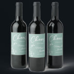 Delicate orchid cheers to the wedding green custom wine label<br><div class="desc">Elegant customizable wine labels for your wedding reception, featuring beautiful and delicate white orchids line drawing on one side, over a romantic sage mint green background, and the wording "Cheers to the wedding of" in white fonts. Easily edit the template fields to add the bride and groom names in a...</div>