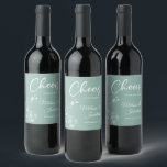 Delicate orchid cheers to the wedding green custom wine label<br><div class="desc">Elegant customizable wine labels for your wedding reception, featuring beautiful and delicate white orchids line drawing on one side, over a romantic sage mint green background, and the wording "Cheers to the wedding of" in white fonts. Easily edit the template fields to add the bride and groom names in a...</div>