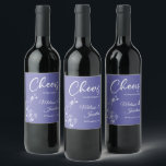Delicate orchid cheers to wedding purple custom wine label<br><div class="desc">Elegant customizable wine labels for your wedding reception, featuring beautiful and delicate white orchids line drawing on one side, over a romantic contemporary periwinkle purple background, and the wording "Cheers to the wedding of" in white fonts. Easily edit the template fields to add the bride and groom names in a...</div>