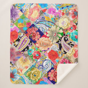 Delicate white roses and peonies with petals and l sherpa blanket