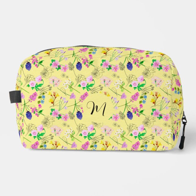Delicate wildflowers in light yellow dopp kit (Front)