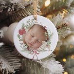 Delicate Wreath First Christmas Photo Ceramic Ornament<br><div class="desc">Celebrate your baby's first Christmas with this cute ornament design featuring a Christmas themed,  delicate watercolor wreath with red baby shoes,  a cute red bow,  a wooden rocking horse toy,  winter berries,  and greenery.</div>