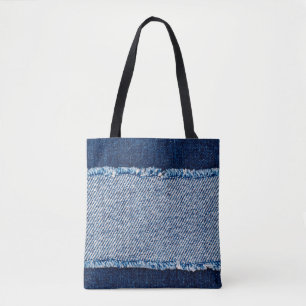 Denim blue jeans fabric frame. Bleached denim fabr Tote Bag