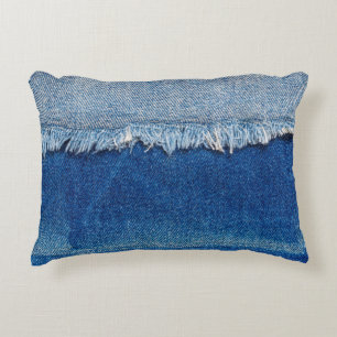 Denim jeans background. Ripped denim fabric with b Accent Pillow