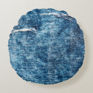 Denim texture.Blue jeans with threads and holes fo Round Pillow