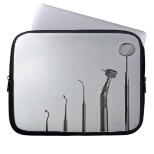 Dentist's instruments laptop sleeve