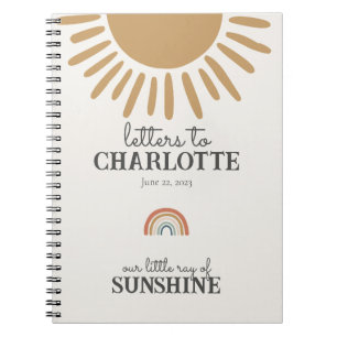 des lettres de soleil boho à mon livre de bébé