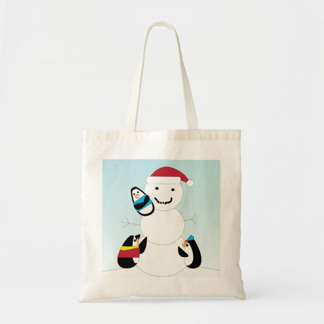 Des pingouins construisent un sac à neige (Devant)