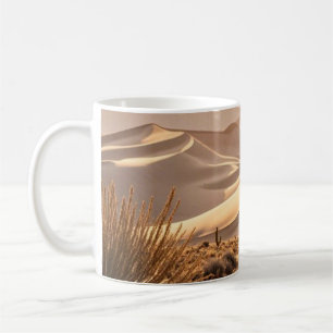 Desert landscape at sunset coffee mug