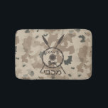 Desert Maccabee Shield And Spears Bath Mat<br><div class="desc">A military brown "subdued" style depiction of a Maccabee's shield and two spears on a desert camo background. The shield is adorned by a lion and text reading "Yisrael" (Israel) in the Paleo-Hebrew alphabet. Text reading "Maccabee" in modern Hebrew also appears. The Maccabees were Jewish rebels who freed Judea from...</div>