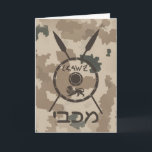 Desert Maccabee Shield And Spears Holiday Card<br><div class="desc">A military brown "subdued" style depiction of a Maccabee's shield and two spears on a desert camo background. The shield is adorned by a lion and text reading "Yisrael" (Israel) in the Paleo-Hebrew alphabet. Hebrew text reading "Maccabee" also appears. Add your own additional text. The Maccabees were Jewish rebels who...</div>