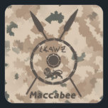 Desert Maccabee Shield And Spears Square Sticker<br><div class="desc">A military brown "subdued" style depiction of a Maccabee's shield and two spears on a desert camo background. The shield is adorned by a lion and text reading "Yisrael" (Israel) in the Paleo-Hebrew alphabet. English text reading "Maccabee" also appears. The Maccabees were Jewish rebels who freed Judea from the yoke...</div>