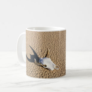 Deserts Cow Skull on the Desert Ground Coffee Mug