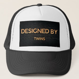 Designed by twins trucker hat for sale.