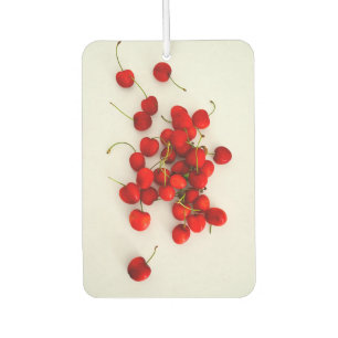 Désodorisant Pour Voiture Cerises rouges à la lumière naturelle Pose sur bla