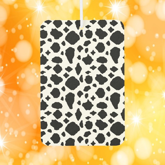 Désodorisant Pour Voiture Cow Pattern Black and White (An air freshener with a black and white cow pattern.)