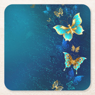 Dessous-de-verre Carré En Papier Papillons dorés sur fond bleu