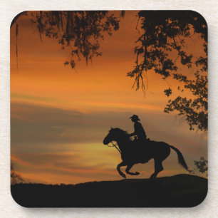 Dessous de verre Cowboy chevauchant dans le couche