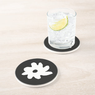 Dessous De Verre En Grès design floral . une fleur noire et blanche