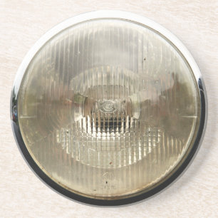 Dessous De Verre En Grès Phare classique de voiture avec la lentille en