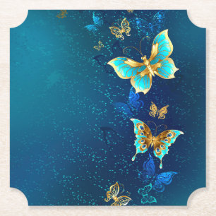 Dessous-de-verre En Papier Papillons d'or sur un Arrière - plan bleu