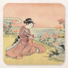 Une femme qui ramasse des chrysanthèmes