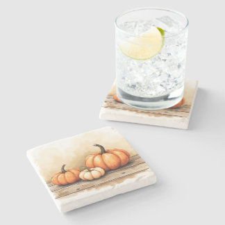 Dessous-de-verre En Pierre Citrouilles d'automne sur table en bois