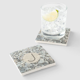 Dessous-de-verre En Pierre Conception de monogramme de rivage de coquillage