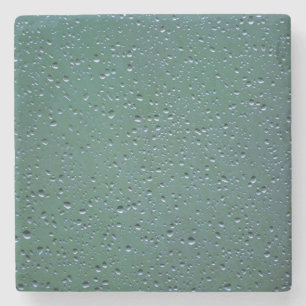 Dessous-de-verre En Pierre Des gouttelettes d'eau sur un Arrière - plan vert