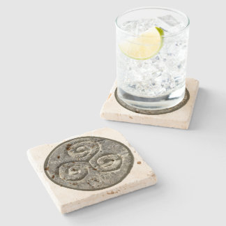 Dessous-de-verre En Pierre Image antique d'un Triskelion