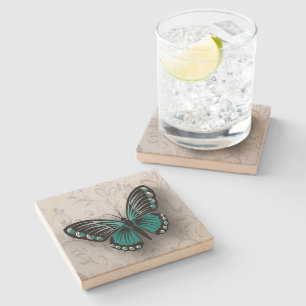 Dessous-de-verre En Pierre Papillon Turquoise géant sur la flore grise