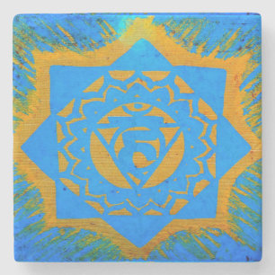 Dessous-de-verre En Pierre symbole tantric d'or sur le bleu