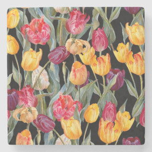 Dessous-de-verre En Pierre Tulipes colorées, arrière - plan noir isolé.