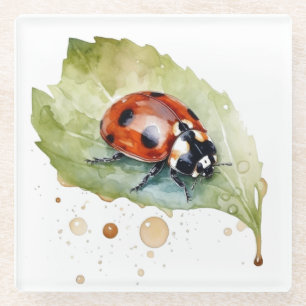 Dessous-de-verre En Verre Ladybug assis sur une feuille d'aquarelle vibrante