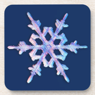 Dessous-de-verre Flocon de neige iridescent sur fond bleu foncé