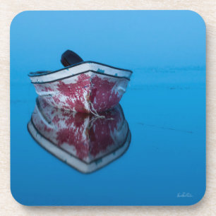 Dessous-de-verre photo d'une barque sur l'eau