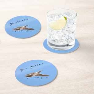 Dessous-de-verre Rond En Papier Mouette en vol dans le ciel bleu