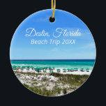 Destin Florida Beach Vacation Keepsake Christmas Ceramic Ornament<br><div class="desc">This beautiful Destin Florida beach vacation keepsake Christmas ornament features the pretty blue green ocean waters of Sandestin along the coast. Pretty teal and blue umbrellas line the summer seashore in front of the sea grass. Lovely white cursive script for my favourite seaside city along the emerald coast. Customize with...</div>