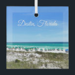 Destin Florida Coast Beach Umbrellas Photography Glass Ornament<br><div class="desc">This beautiful Destin Florida beach Christmas ornament features the pretty blue green ocean waters of Sandestin along the coast. Pretty teal and blue umbrellas line the summer seashore in front of the sea grass. Lovely white cursive script for my favourite seaside city along the emerald coast.</div>