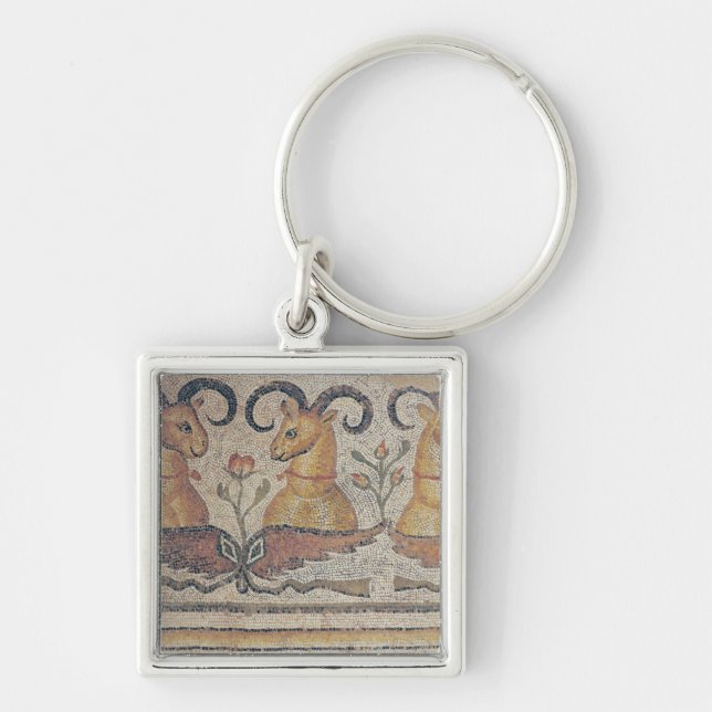 Detail from the border of a pavement keychain (Front)