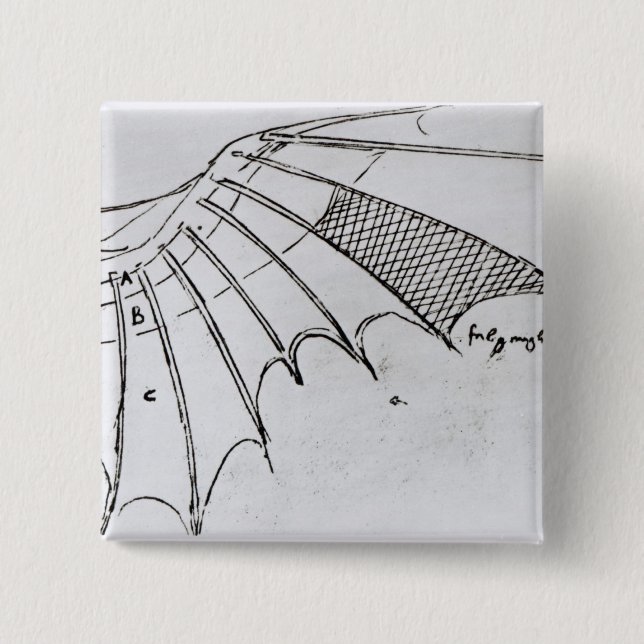 Detail of a mechanical wing 2 inch square button (Front)