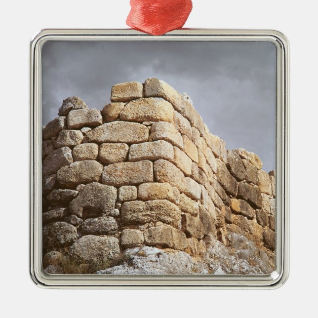 Detail of a stone wall metal ornament (Front)